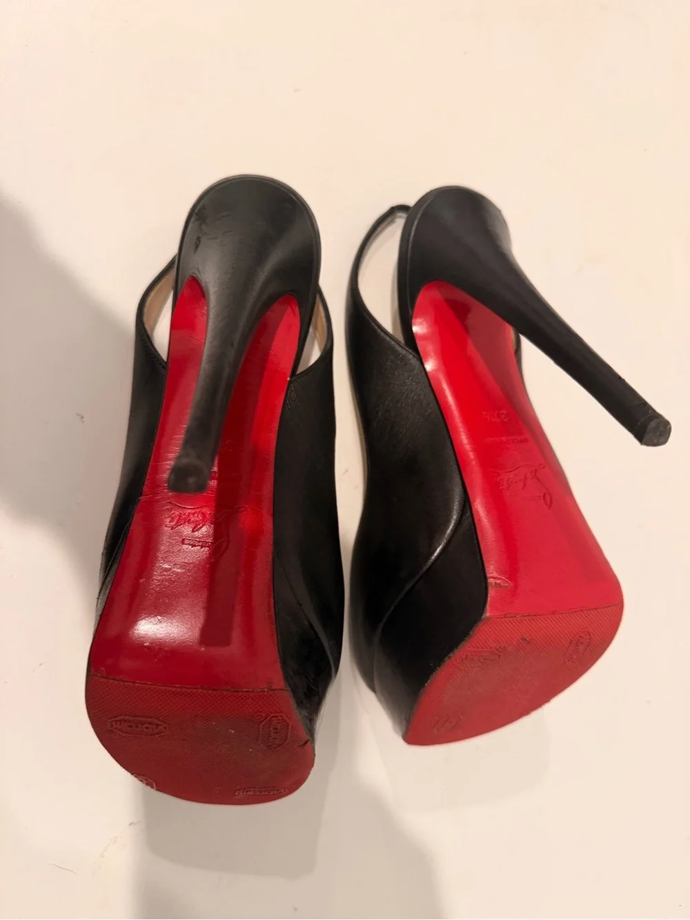 Christian Louboutin Black Leather Peep-Toe Slingback Pumps with Red Soles